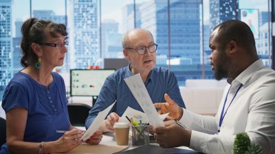 senior people discussing a pension financial strategy with broker senior people discussing a pension financial strategy with broker
